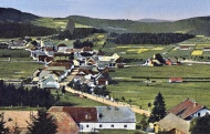 Strážný, pohled z jihu, 30. léta 20. stol, v popředí osada „Rack“		          zdroj: www.zanikleobce.cz